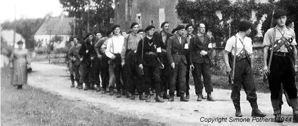 French resistance marching through a village